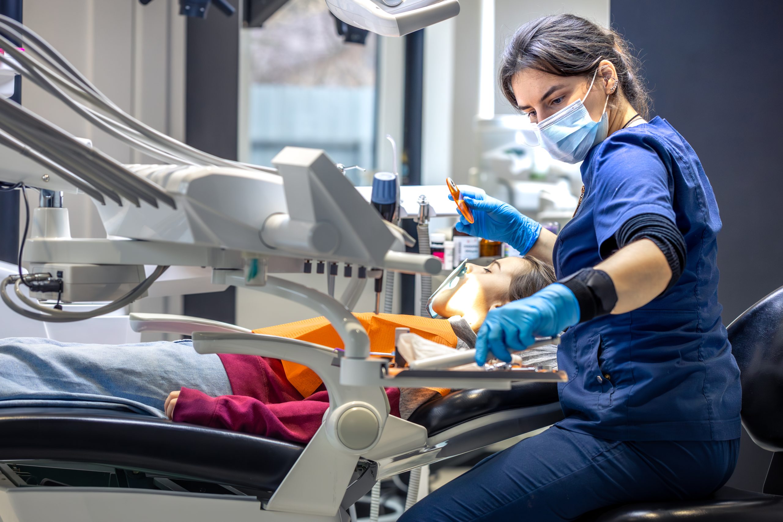 doctor providing emergency dentistry